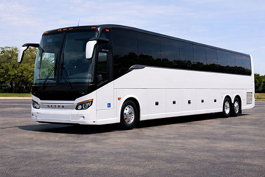56-passenger charter bus rental Missoula TX